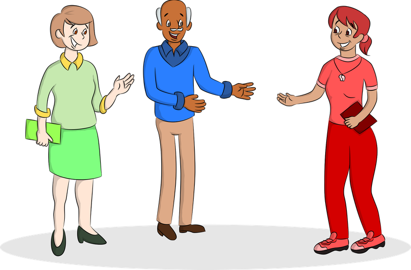 Drei Lehrpersonen, die miteinander sprechen